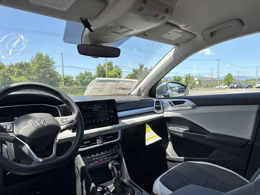 new 2025 Volkswagen Taos car, priced at $28,221