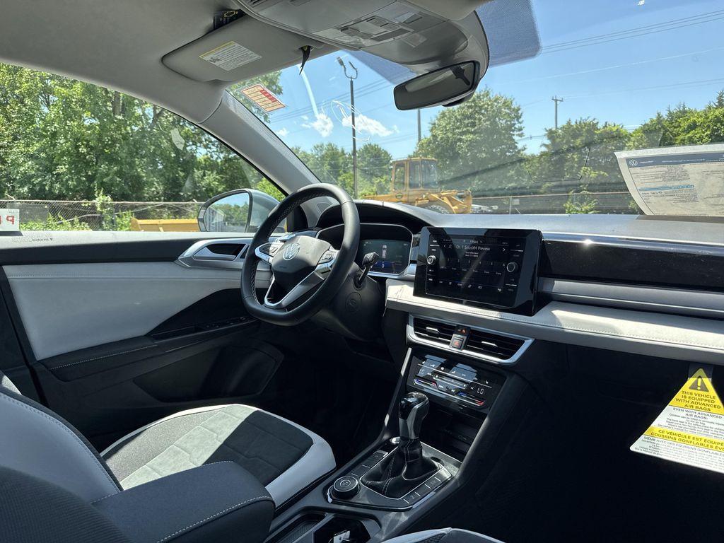 new 2025 Volkswagen Taos car, priced at $28,221