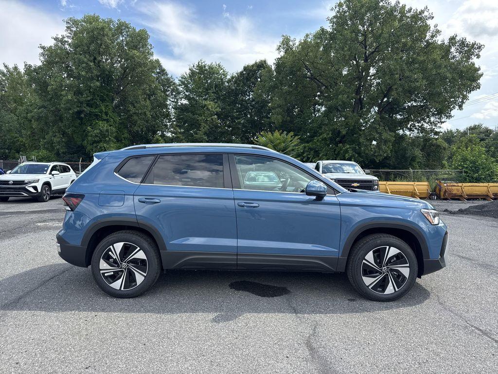 new 2025 Volkswagen Taos car, priced at $28,221