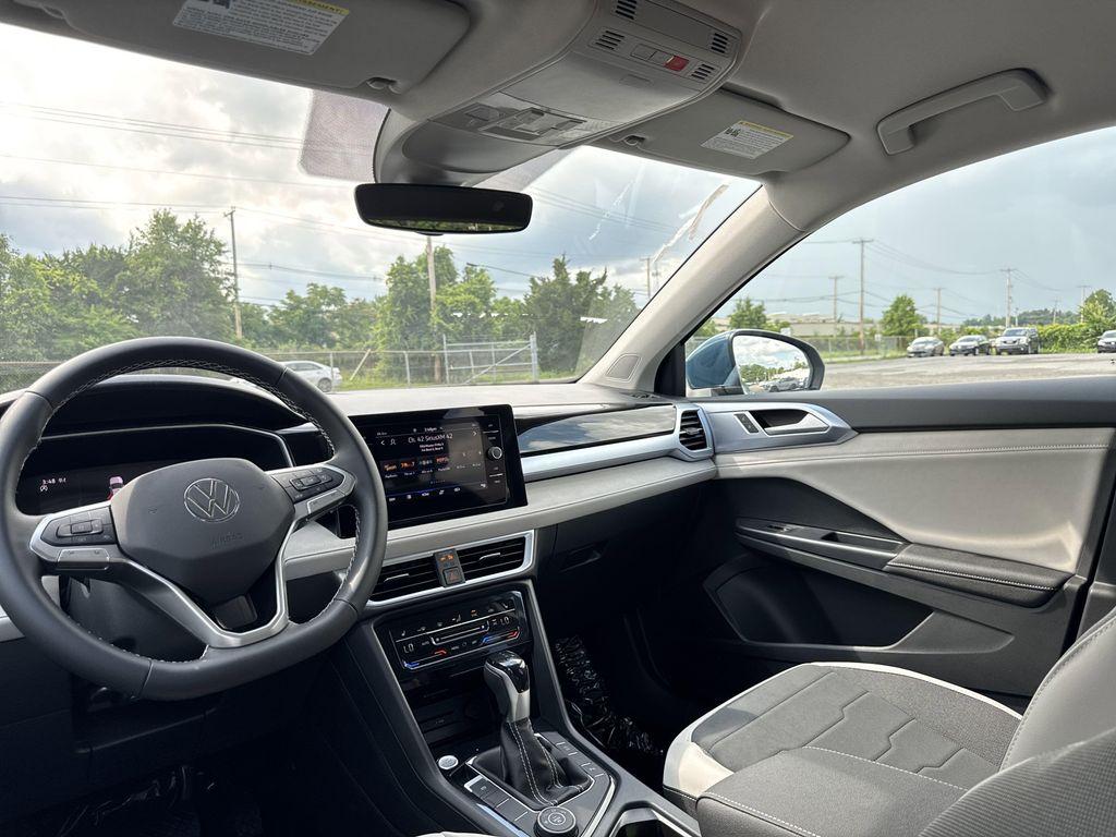 new 2025 Volkswagen Taos car, priced at $28,221