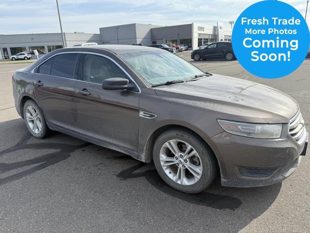 used 2015 Ford Taurus car, priced at $6,000