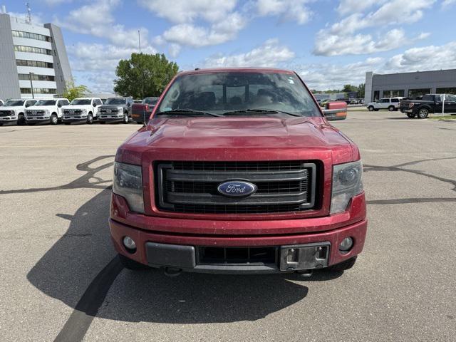used 2014 Ford F-150 car, priced at $12,000