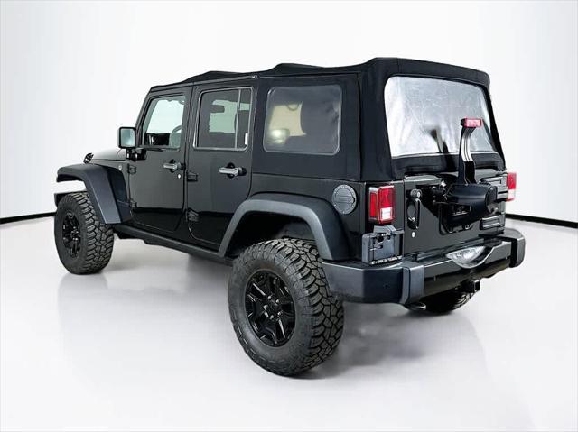 used 2018 Jeep Wrangler JK Unlimited car, priced at $23,975