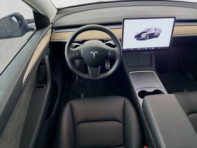 used 2025 Tesla Model Y car, priced at $42,739