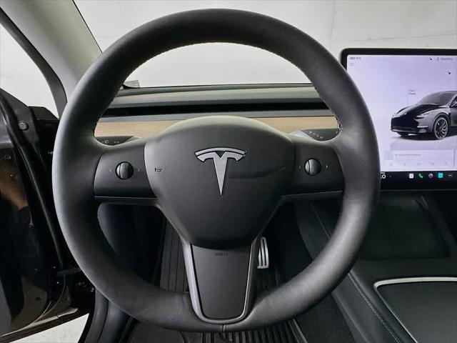 used 2025 Tesla Model Y car, priced at $42,739