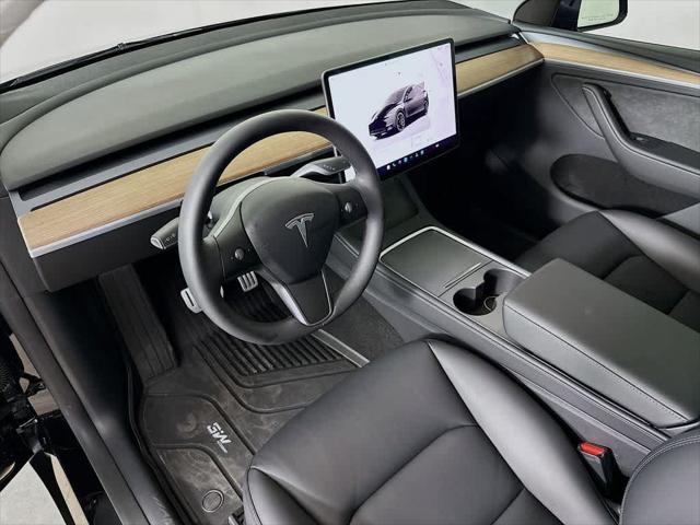 used 2025 Tesla Model Y car, priced at $42,739