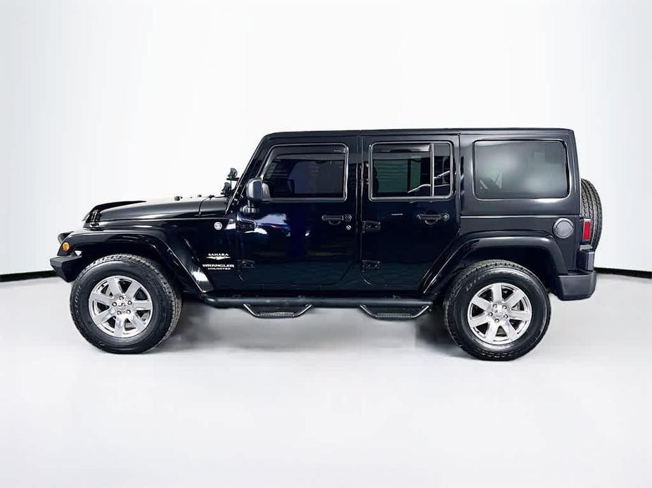 used 2015 Jeep Wrangler Unlimited car, priced at $20,380