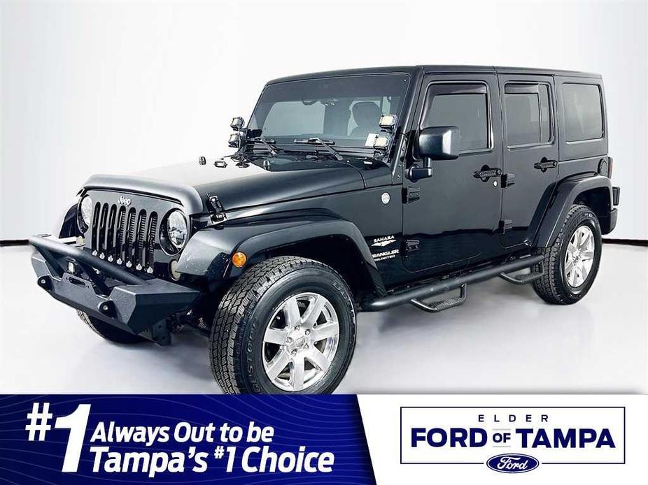 used 2015 Jeep Wrangler Unlimited car, priced at $19,395