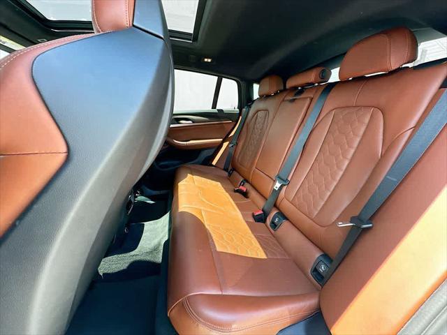used 2020 BMW X4 M car, priced at $49,837