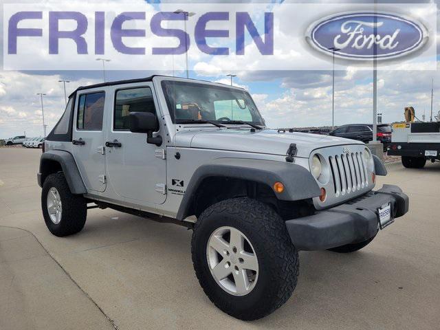 used 2009 Jeep Wrangler Unlimited car, priced at $11,999