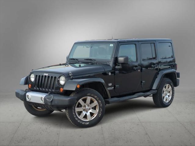 used 2011 Jeep Wrangler Unlimited car, priced at $15,004