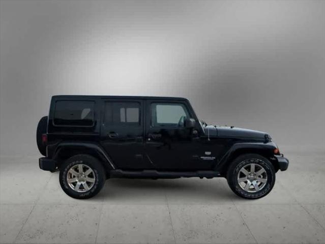 used 2011 Jeep Wrangler Unlimited car, priced at $16,495