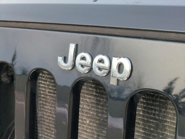 used 2011 Jeep Wrangler Unlimited car, priced at $16,495