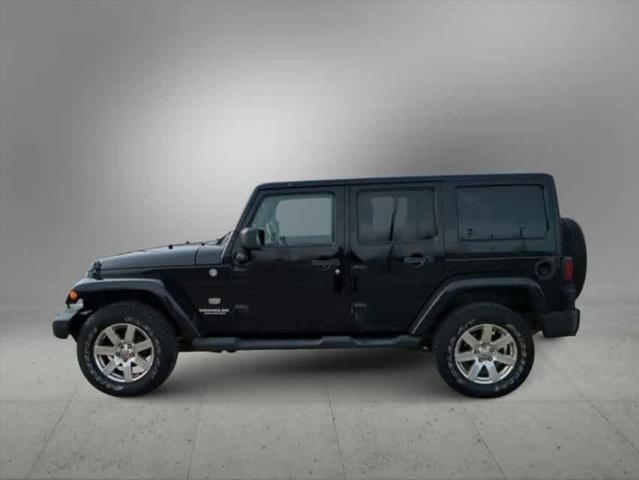 used 2011 Jeep Wrangler Unlimited car, priced at $15,004