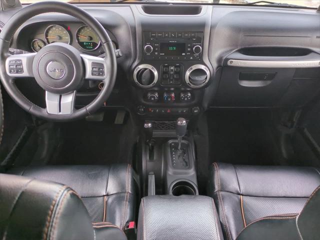 used 2011 Jeep Wrangler Unlimited car, priced at $15,004