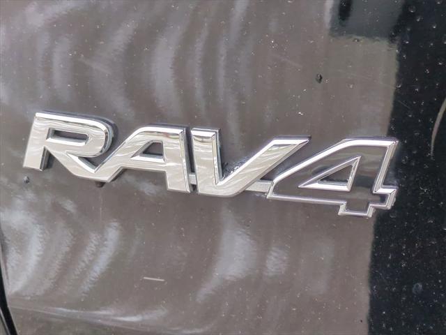 used 2023 Toyota RAV4 car, priced at $29,999