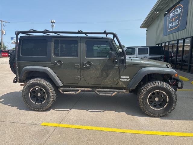 used 2015 Jeep Wrangler Unlimited car, priced at $13,999