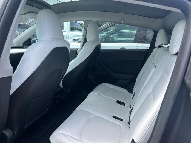 used 2023 Tesla Model Y car, priced at $28,389