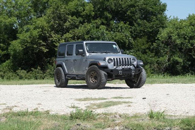 used 2018 Jeep Wrangler Unlimited car, priced at $23,186