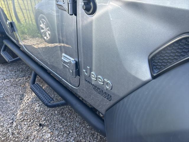 used 2018 Jeep Wrangler Unlimited car, priced at $25,463