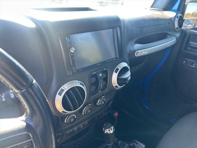 used 2016 Jeep Wrangler Unlimited car, priced at $18,674