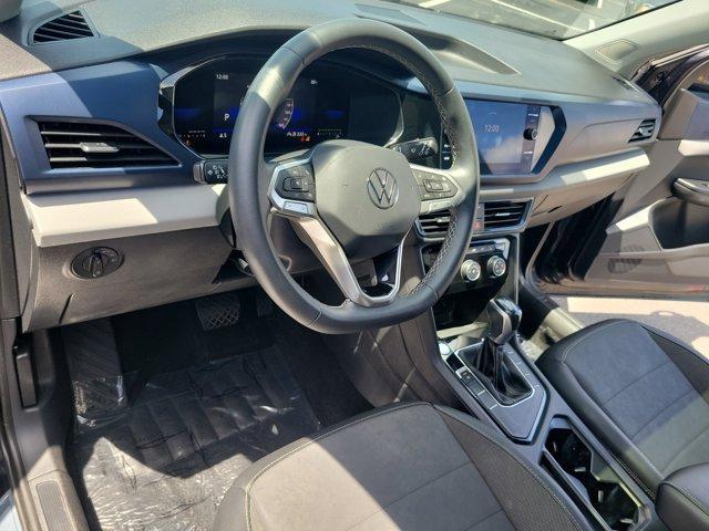 used 2023 Volkswagen Taos car, priced at $21,297