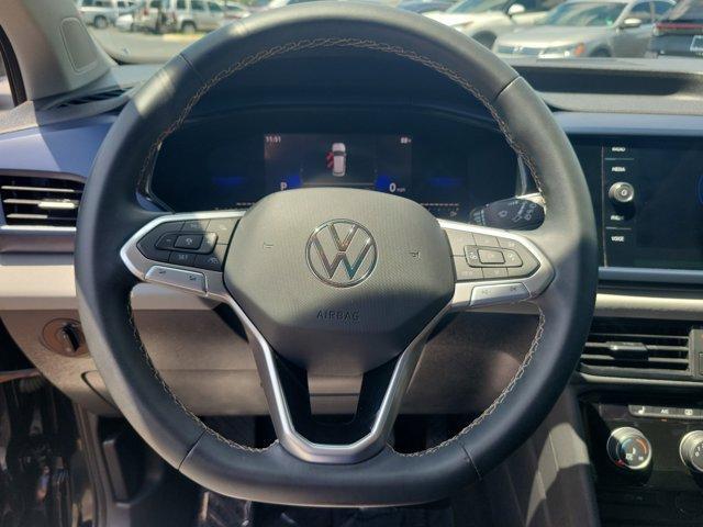 used 2023 Volkswagen Taos car, priced at $21,297