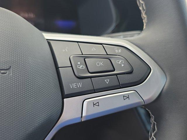 used 2024 Volkswagen Taos car, priced at $20,695