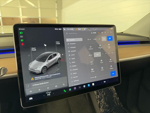 used 2024 Tesla Model Y car, priced at $35,987