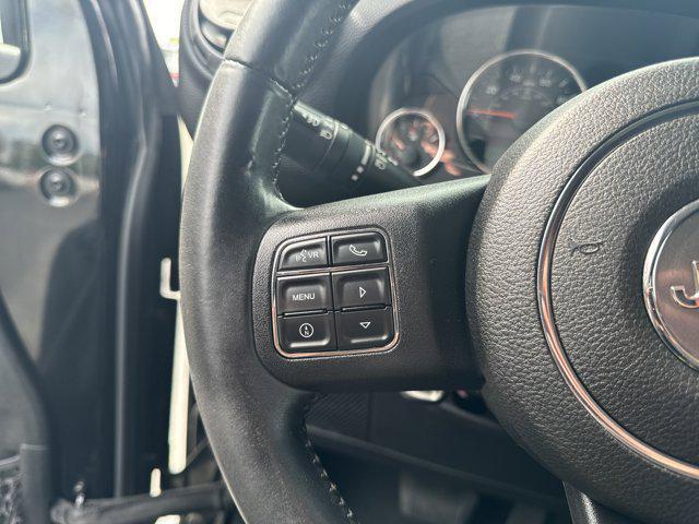 used 2013 Jeep Wrangler Unlimited car, priced at $15,988