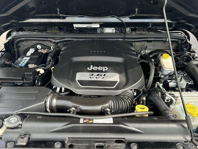 used 2013 Jeep Wrangler Unlimited car, priced at $15,988