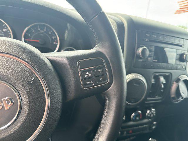 used 2013 Jeep Wrangler Unlimited car, priced at $15,988