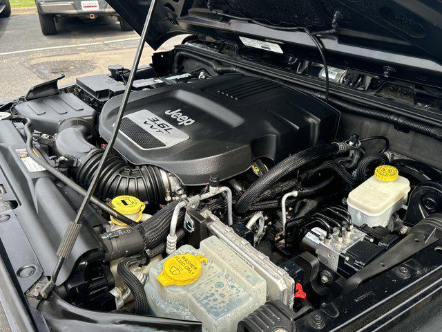 used 2013 Jeep Wrangler Unlimited car, priced at $15,988