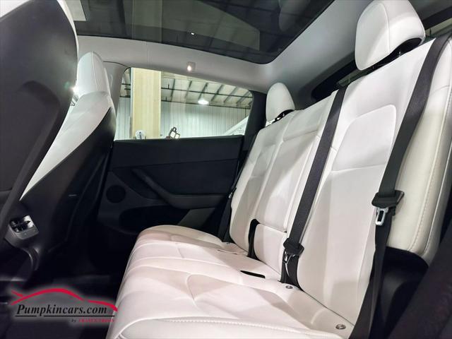 used 2023 Tesla Model Y car, priced at $35,995