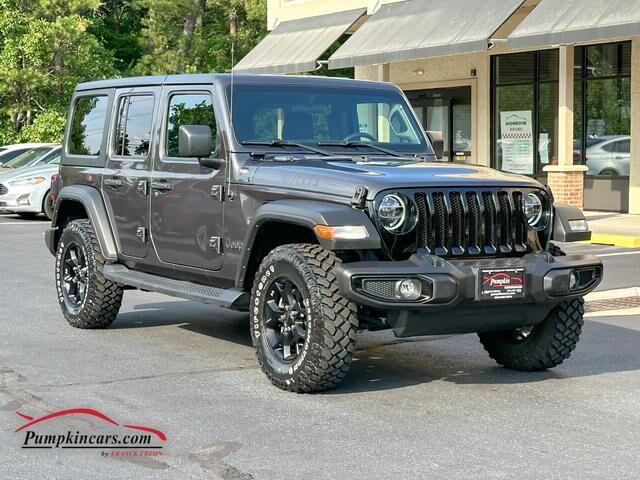 used 2021 Jeep Wrangler Unlimited car, priced at $34,495