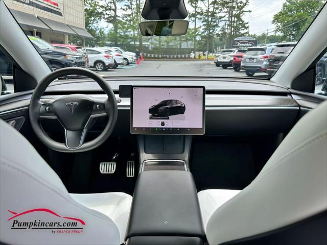 used 2023 Tesla Model Y car, priced at $35,995