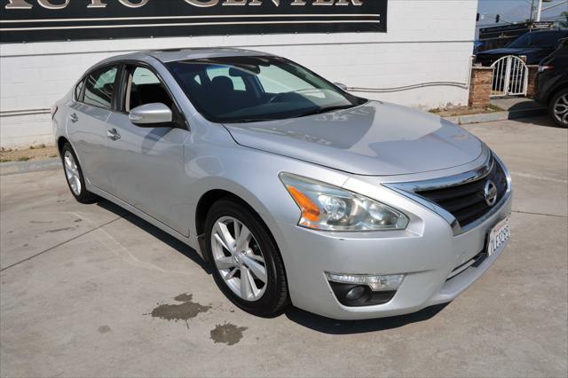 used 2015 Nissan Altima car, priced at $7,995