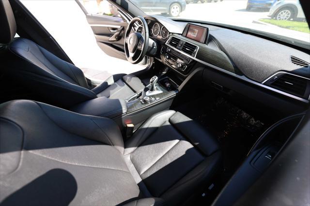 used 2018 BMW 330 car, priced at $12,995