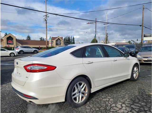 used 2016 Ford Fusion car, priced at $7,975