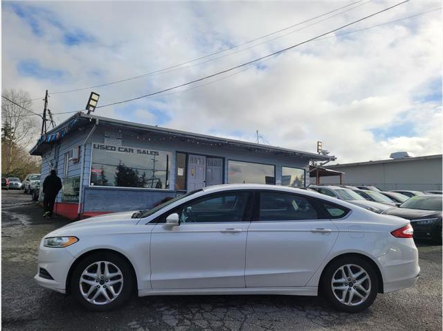 used 2016 Ford Fusion car, priced at $7,725