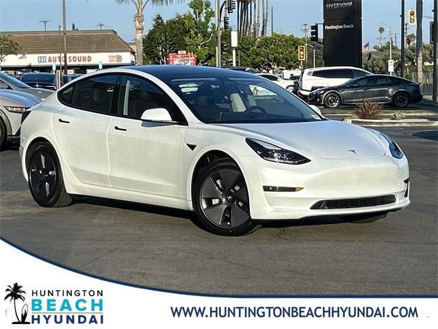 used 2023 Tesla Model 3 car, priced at $25,700