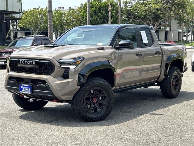 used 2025 Toyota Tacoma Hybrid car, priced at $65,883