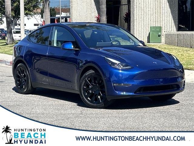 used 2023 Tesla Model Y car, priced at $33,443