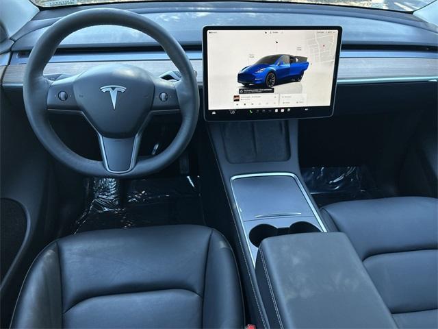 used 2023 Tesla Model Y car, priced at $33,443