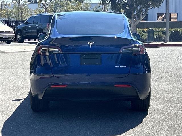 used 2023 Tesla Model Y car, priced at $33,443