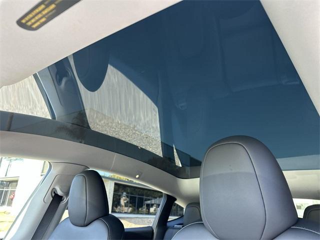 used 2024 Tesla Model Y car, priced at $34,443