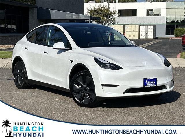used 2024 Tesla Model Y car, priced at $34,443