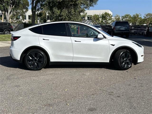 used 2024 Tesla Model Y car, priced at $34,443