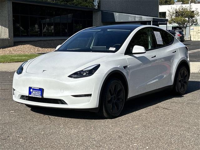 used 2024 Tesla Model Y car, priced at $34,443