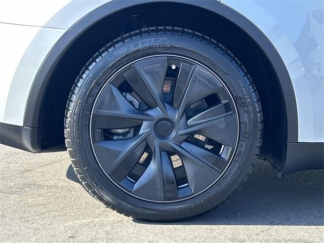 used 2024 Tesla Model Y car, priced at $34,443
